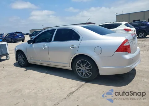 2012 Ford Fusion Hybrid из США, поврежденный, VIN 3FADP0L38CR450279